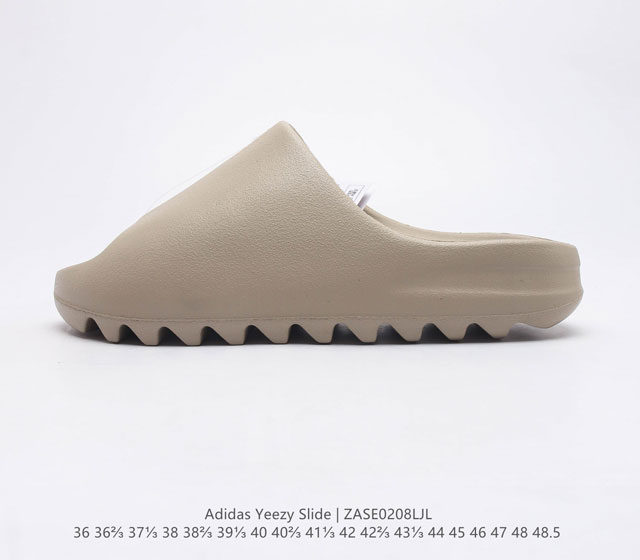 阿迪达斯 Adidas YEEZY SLIDE 经典运动拖鞋时尚厚底增高男女一字拖鞋 YEEZY SLIDE椰子拖鞋的外观十分吸引人 融合了舒适与时尚的元素 延